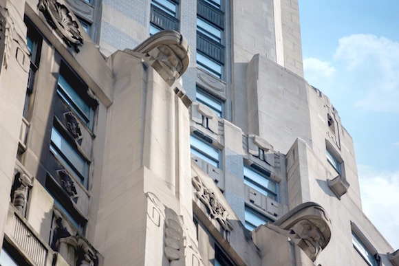 Facade of 20 Exchange Place, displaying Art Deco ornaments and design.